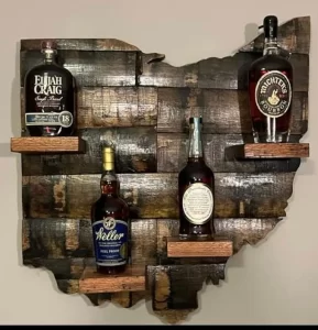 Bourbon Barrel Bottle Display in the shape of hillbilly Ohio.