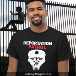 Peoud MAGA Amaerican wearing a black Deportation Patrol Squad Shirt at the border wall.